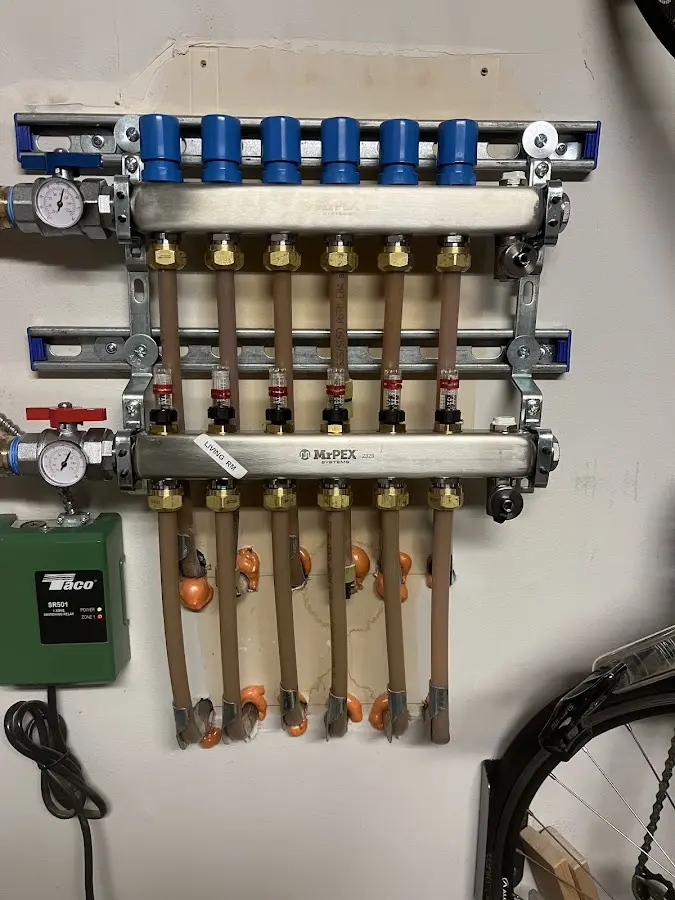 Plumber performing Water Heater Repair at a residential property in Old Saybrook